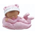 Figurine baptême bébé fille sur coussin rose